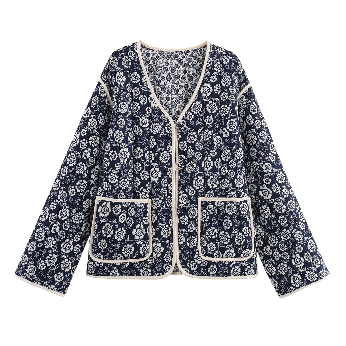 Ladies quilted jacket with floral allover, V-neck, contrast piping and patch pockets Chichicherry