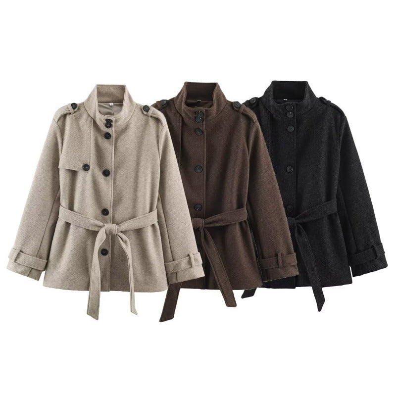 Women's short tailored coat jacket made of wool blend with standing collar, shoulder patches, and tie belt Chichicherry