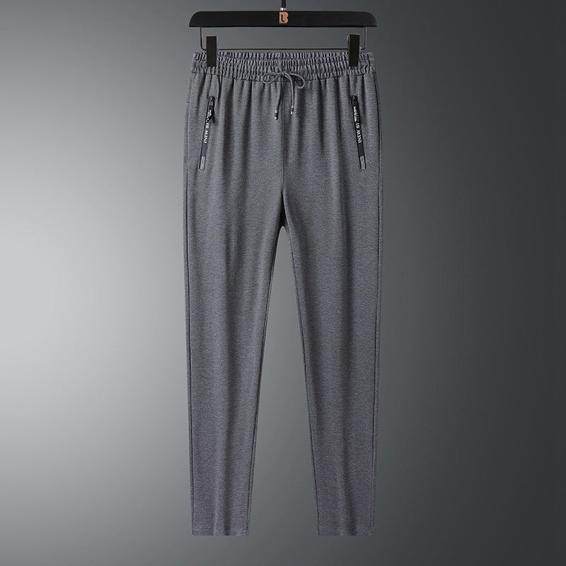 Men's Lightweight Performance Jogging Pants with Elastic Waistband Zipper Pockets and Slim Fit Chichicherry