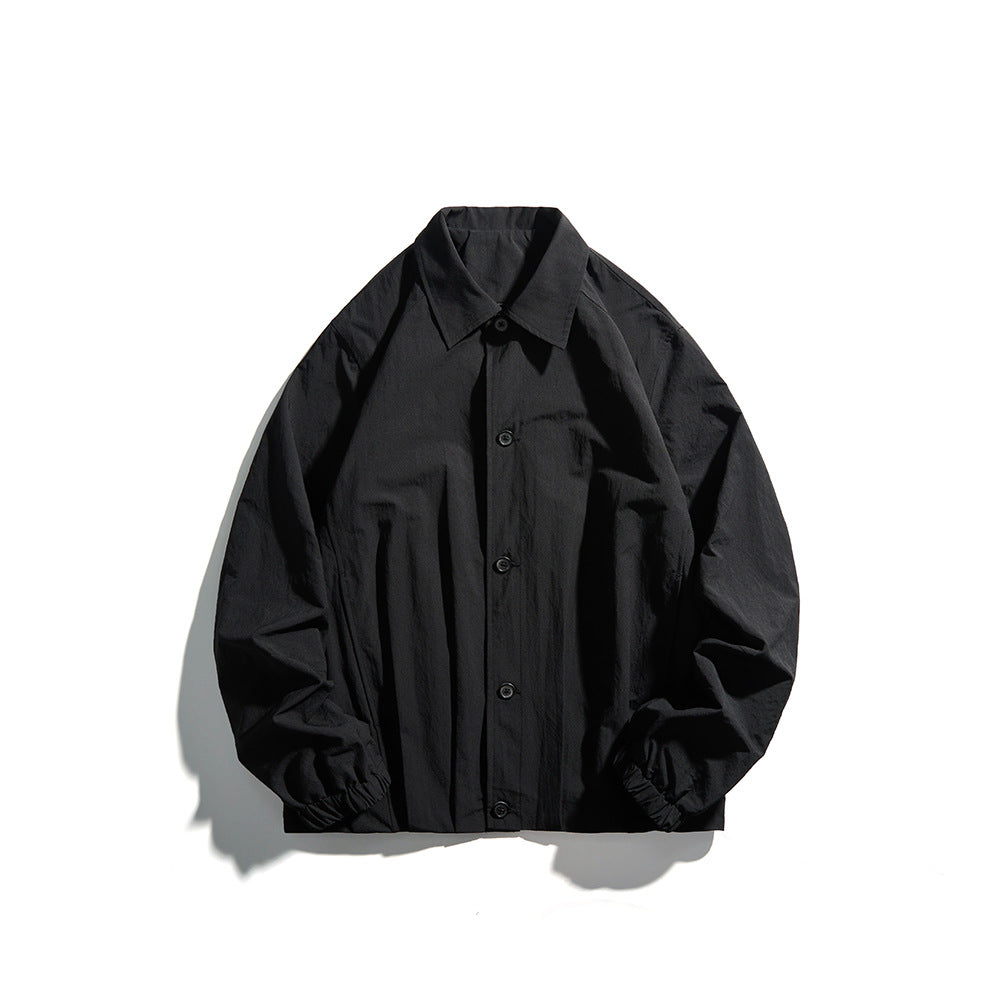 Unisex Lightweight Shirt Jacket in Boxy Cut with Wooden Button Placket and Elastic Cuffs Chichicherry