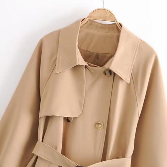 Women Short Tailored Trench Coat with Tied Belt, Asymmetrical Storm Flap and Cuff Strap Chichicherry