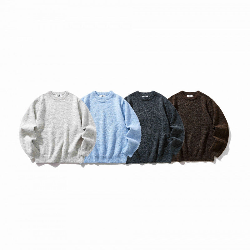 Unisex Oversize fine knit sweater with round neckline, ribbed cuffs, and mottled wool blend Chichicherry