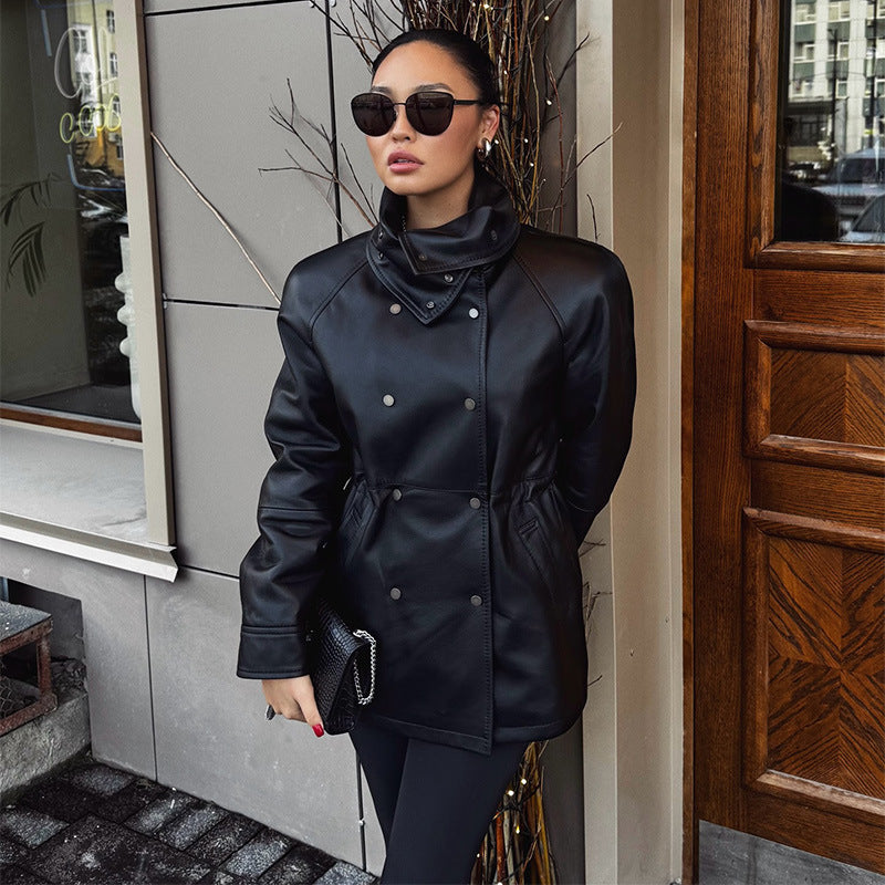 Women's rain jacket made of leather look with high stand-up collar, waist drawstring and snap button front Chichicherry