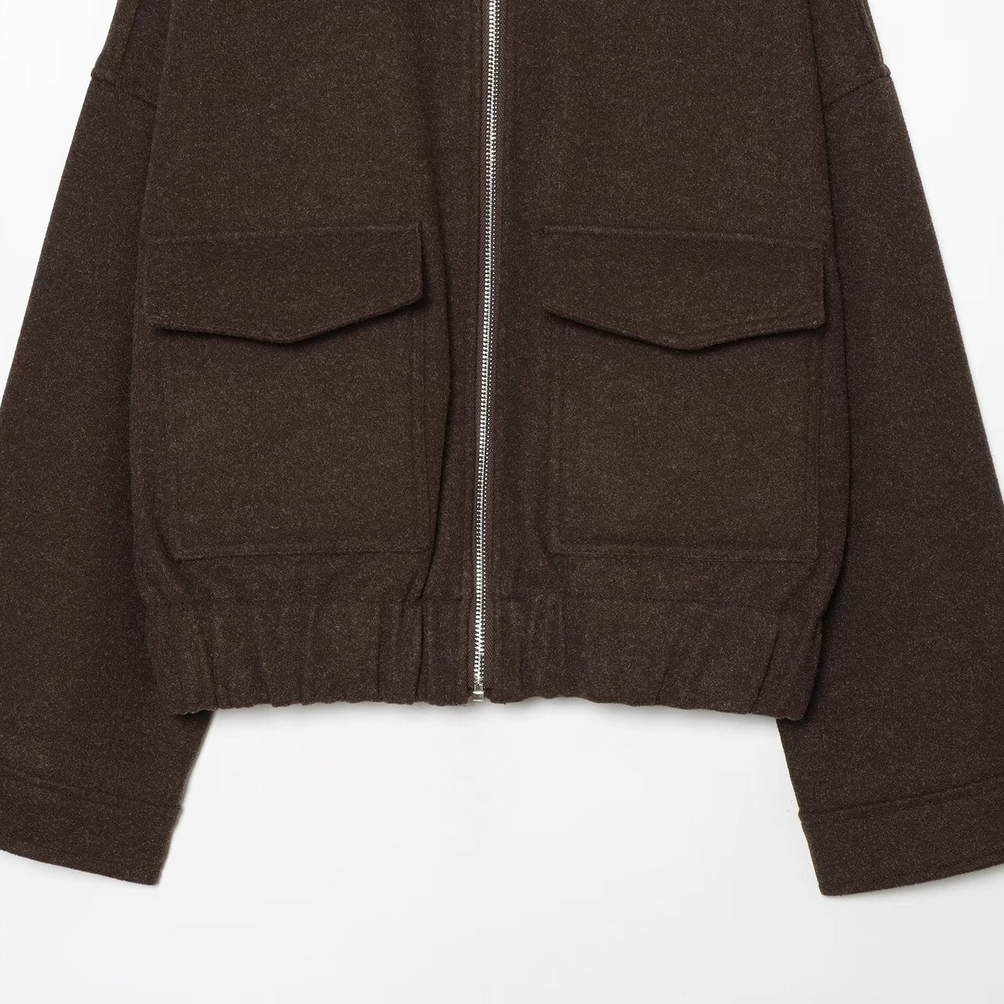 Ladies short jacket made of wool blend with zipper, flap pockets and elastic hem Chichicherry
