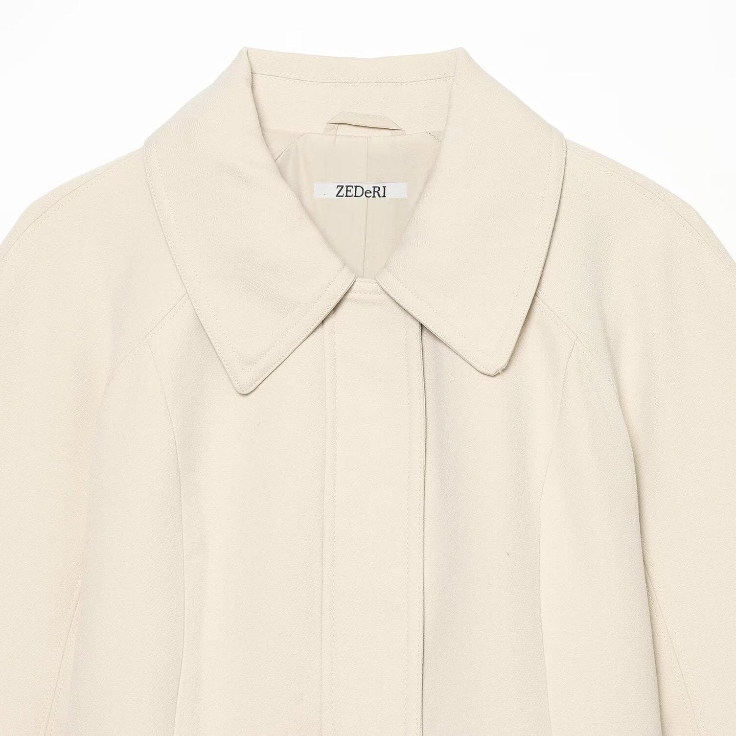 Women's cropped jacket in minimalist trench style with wide shirt collar and tie belt Chichicherry
