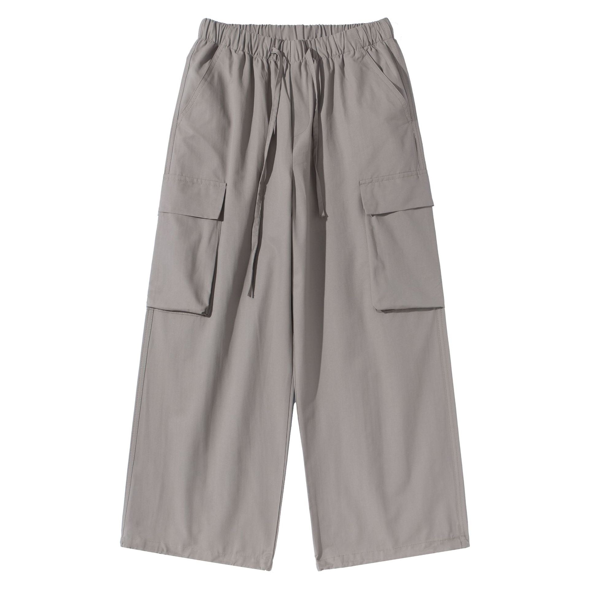 Women's culotte cargo bermudas in utility look with elastic tunnel drawstring waistband and large flap pockets.