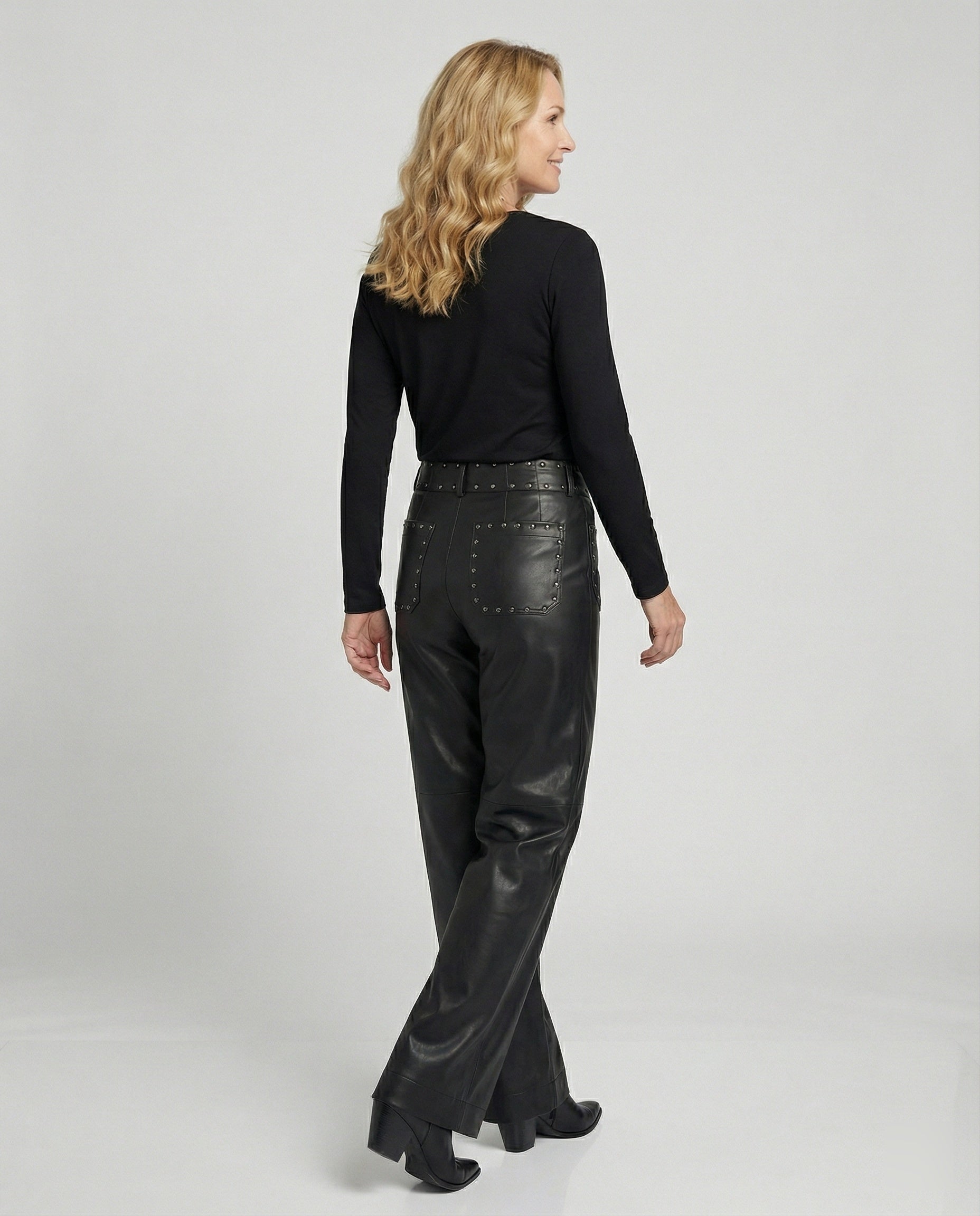 Women's trendy faux leather pants with studs