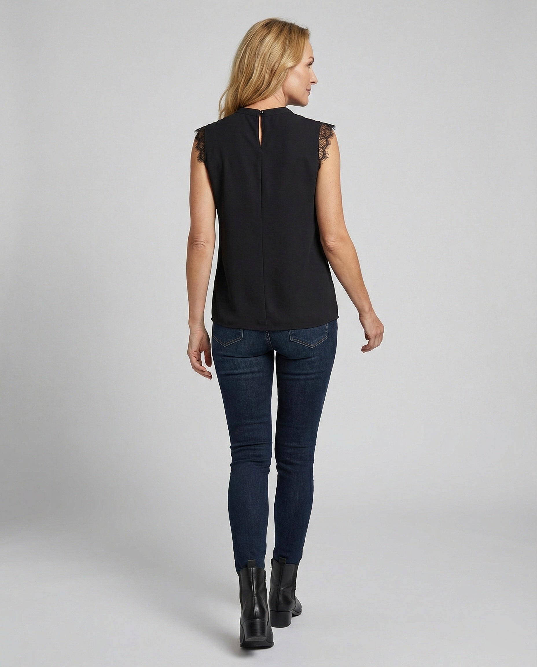 Sleeveless lace blouse women with round neckline