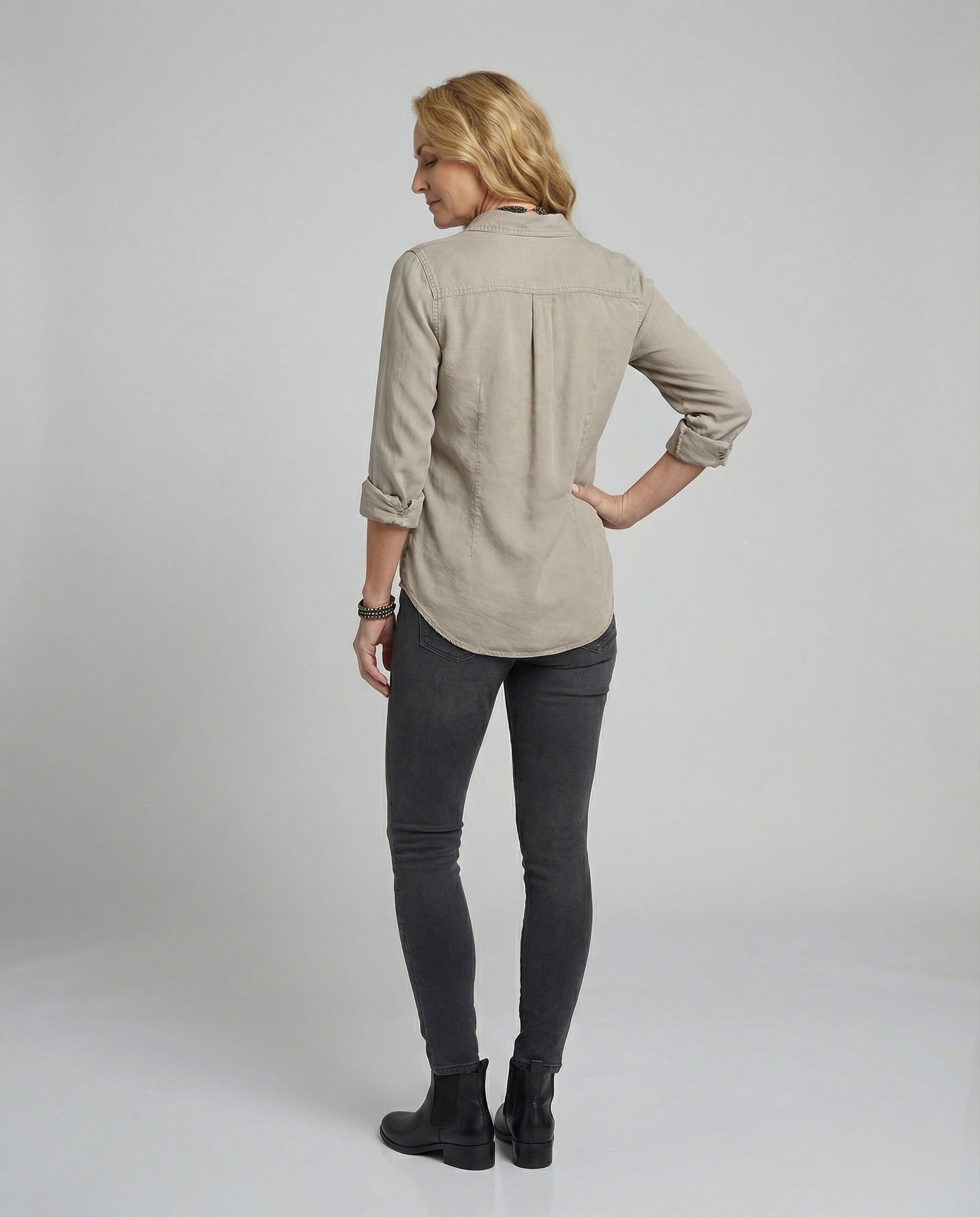 Women elegant blouse with deep V-neck