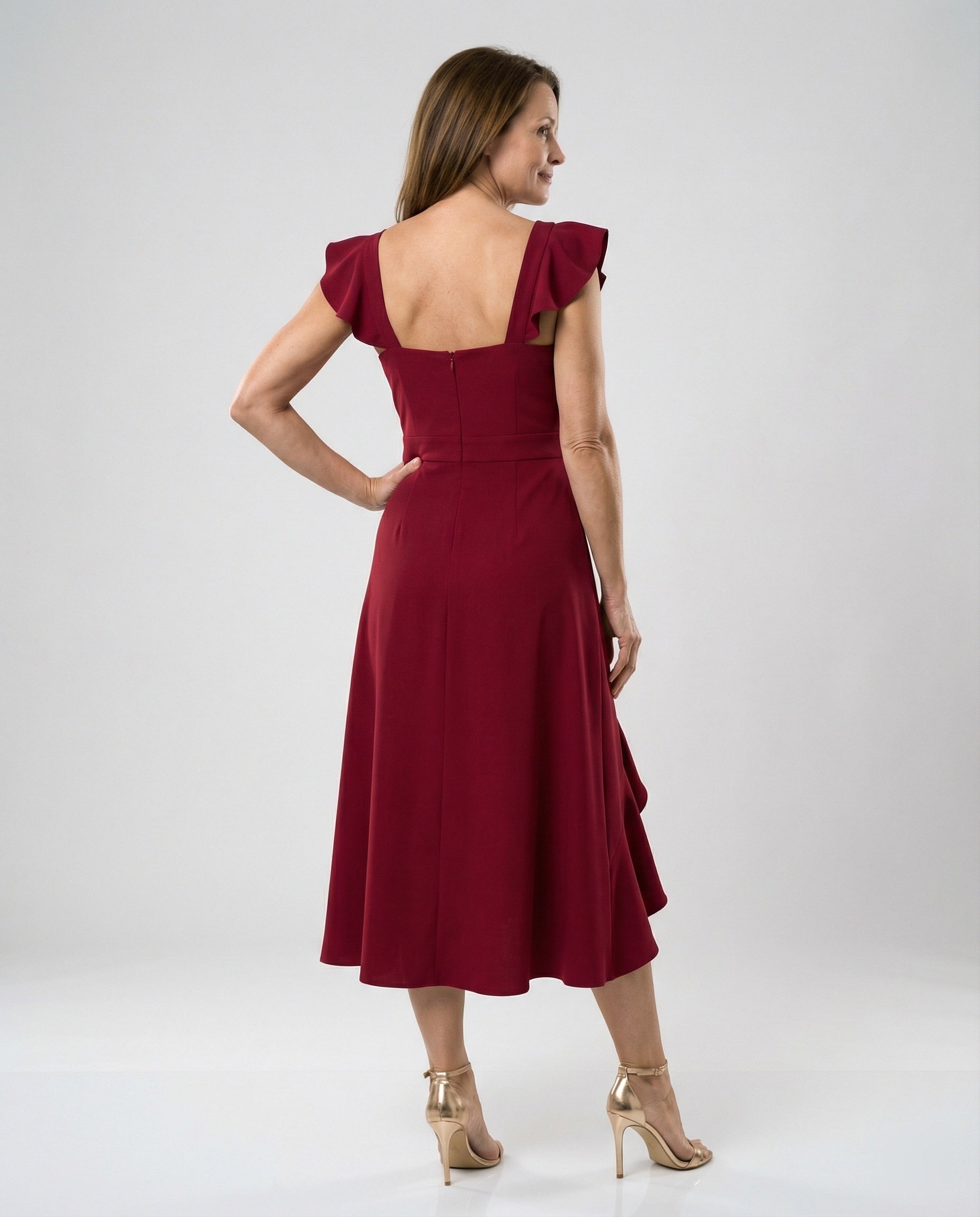 Figure-hugging midi dress with asymmetrical ruffle