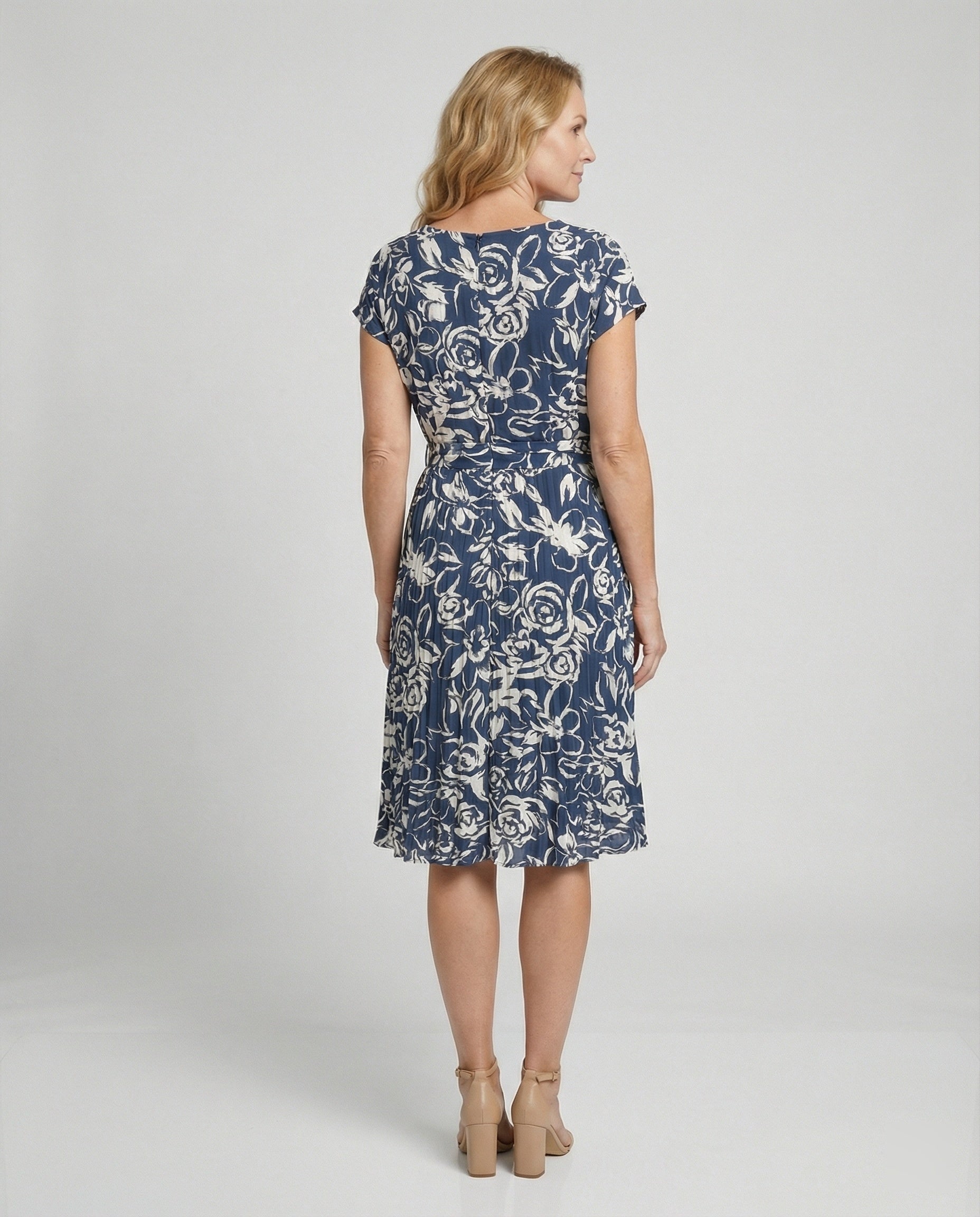 Women's dress with floral pattern and tie belt