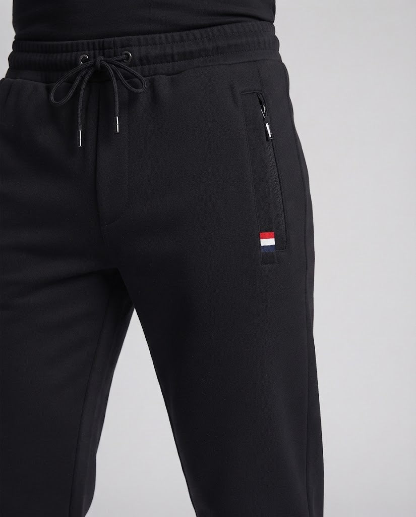 Men's sporty joggers with elastic waistband, drawstring, and zip pockets Chichicherry