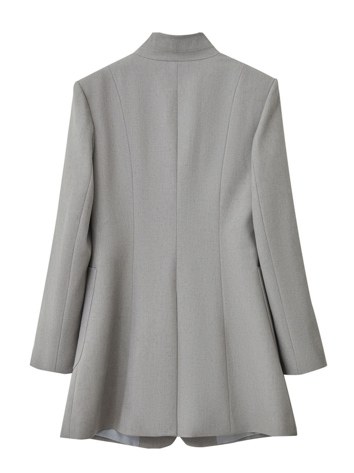 Flat-lay back of black blazer, showing vent and back seam