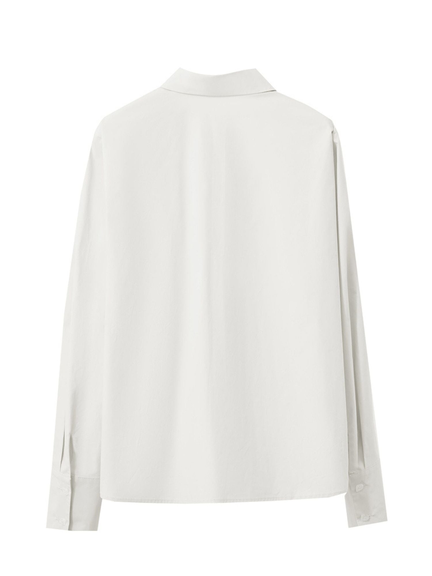 Flat‑lay back of oversized white long sleeves displaying back drape and hemline