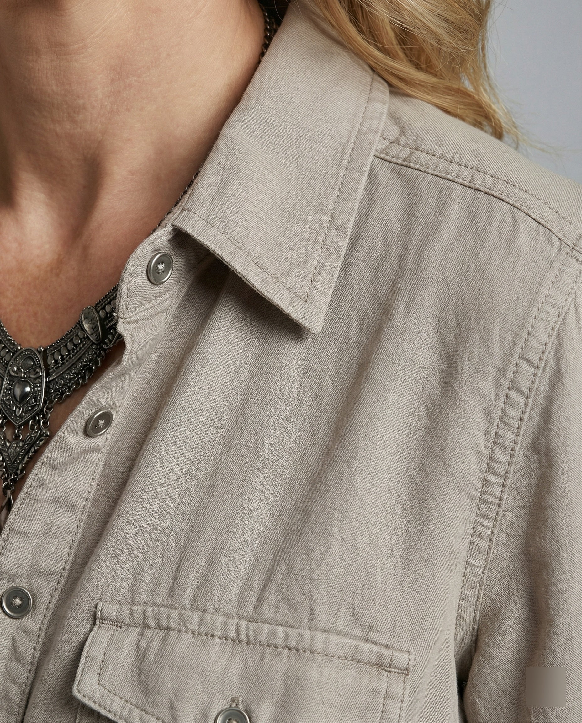 Women elegant blouse with deep V-neck
