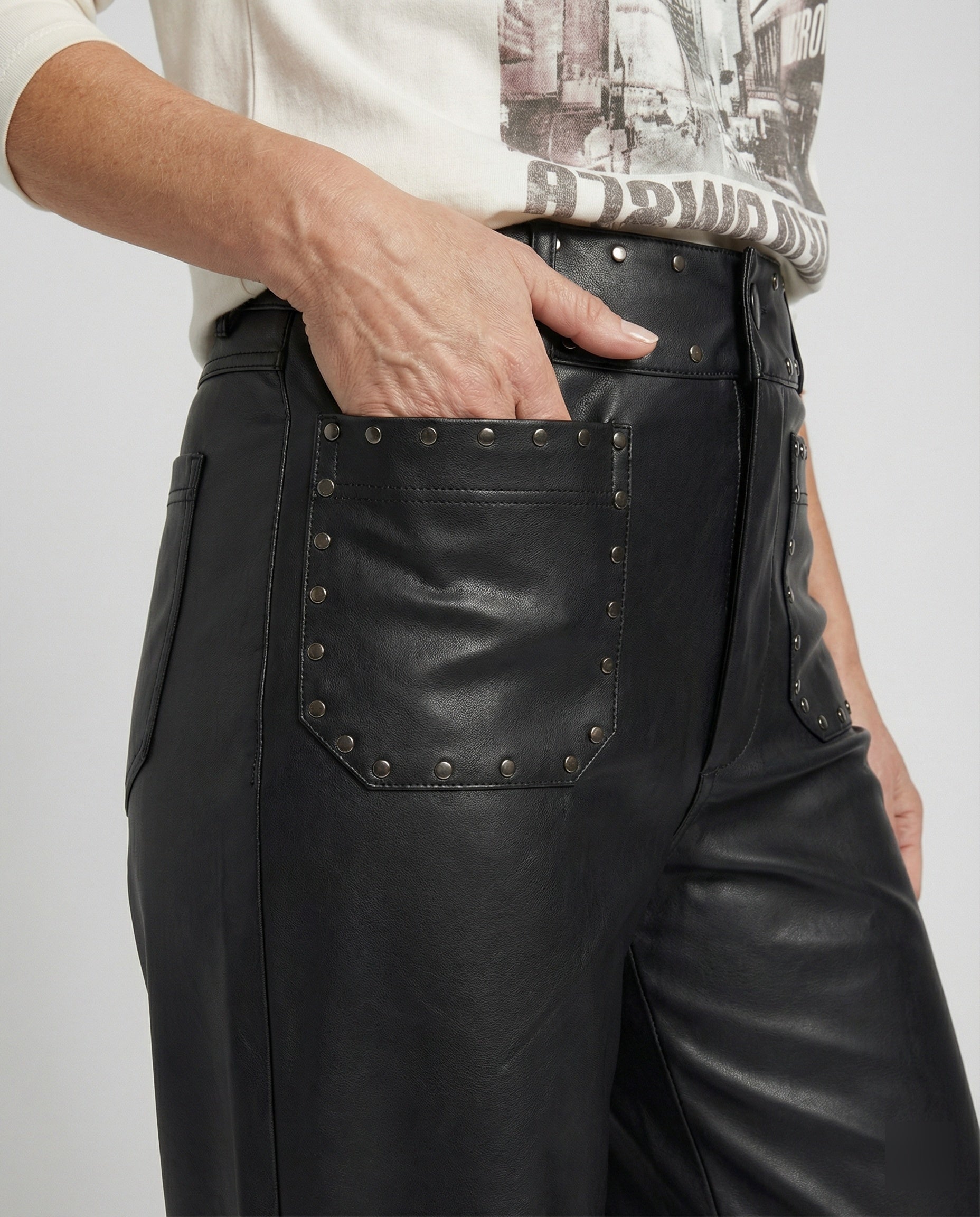 Women's trendy faux leather pants with studs