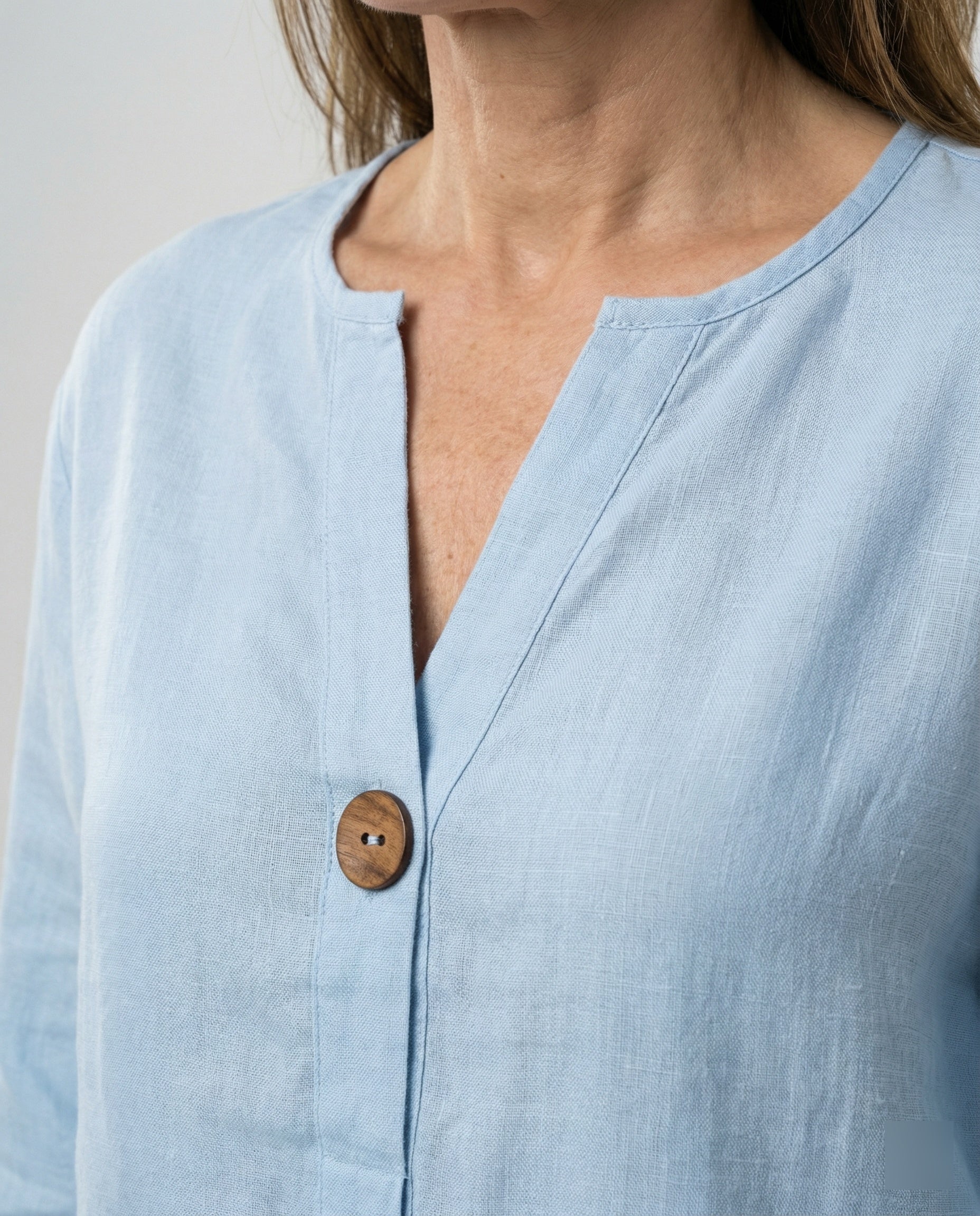 Women's lightweight linen blouse with button details