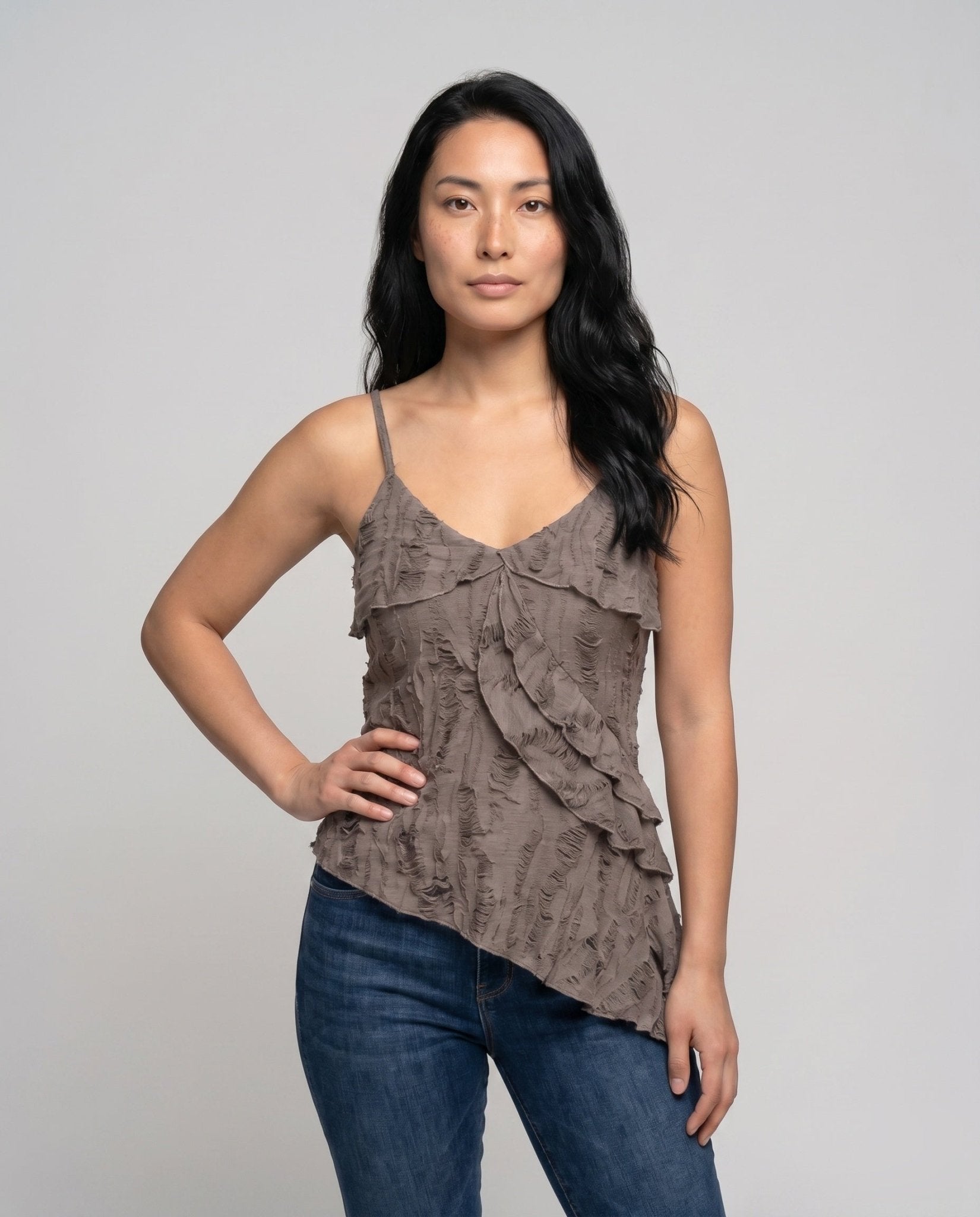 Ladies asymmetrical top with flowing fabric and ruffles - Chichicherry