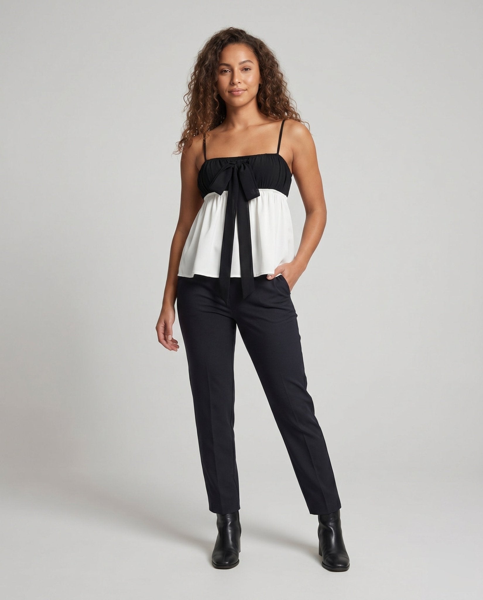 Ladies Charming Tank Top with Bow Accent and Flowing Hem - Chichicherry