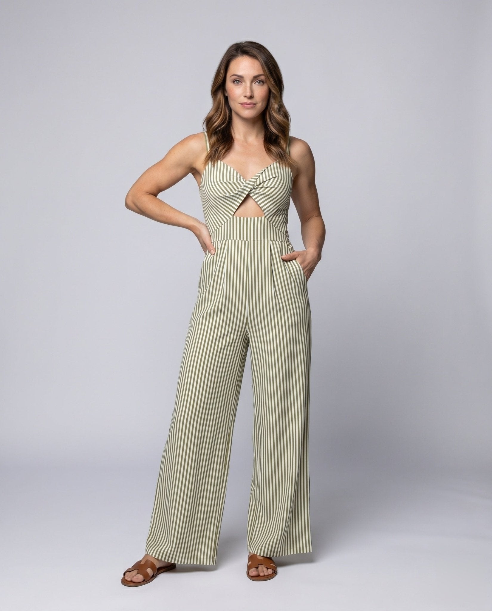 Ladies' fashionable jumpsuit with striking cut-out and chic striped pattern - Chichicherry