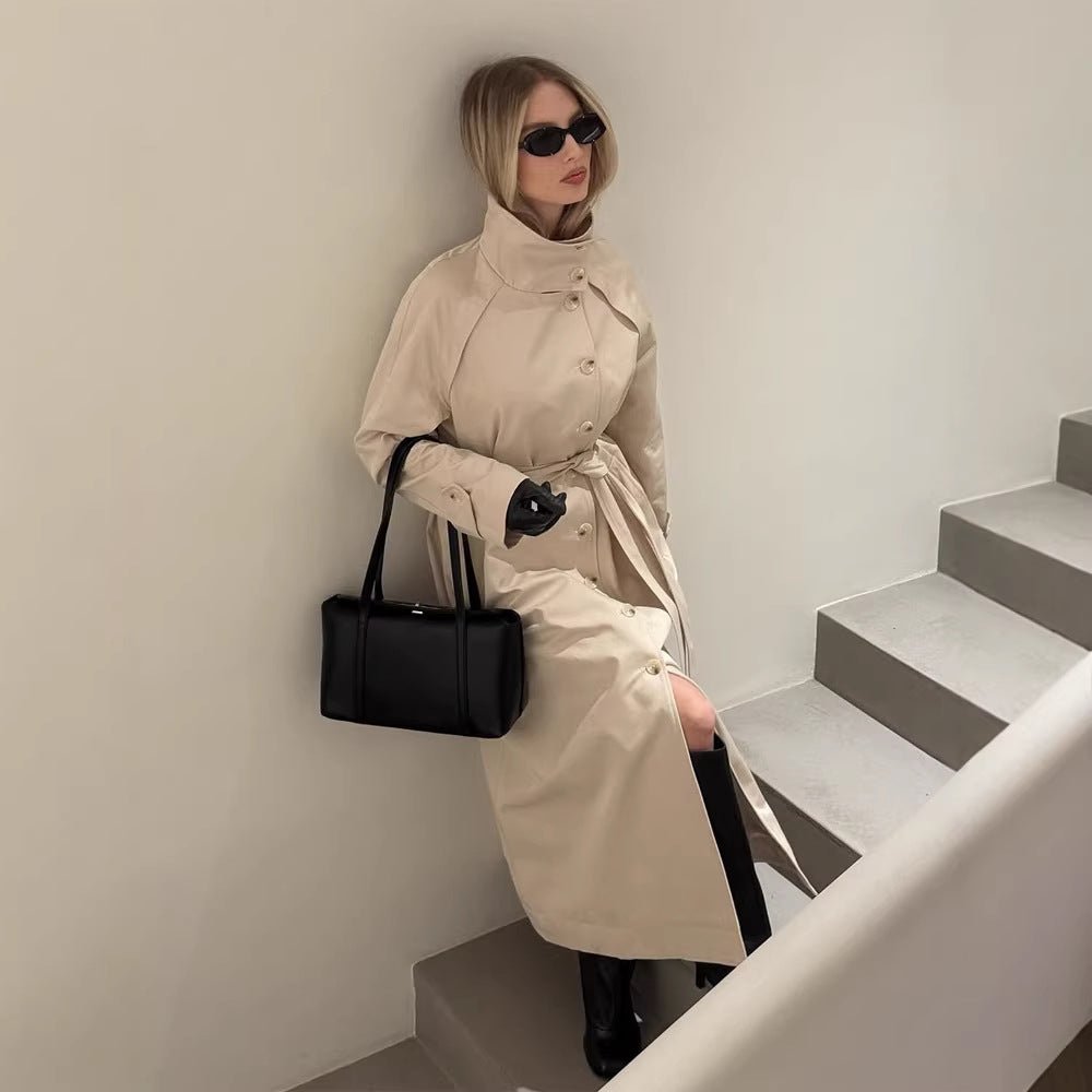 Ladies maxilength trench coat with high stand-up collar, double-breasted button placket and tie belt Chichicherry - Chichicherry