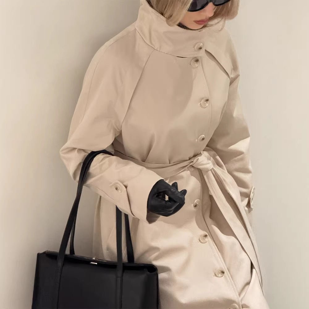 Ladies maxilength trench coat with high stand-up collar, double-breasted button placket and tie belt Chichicherry - Chichicherry