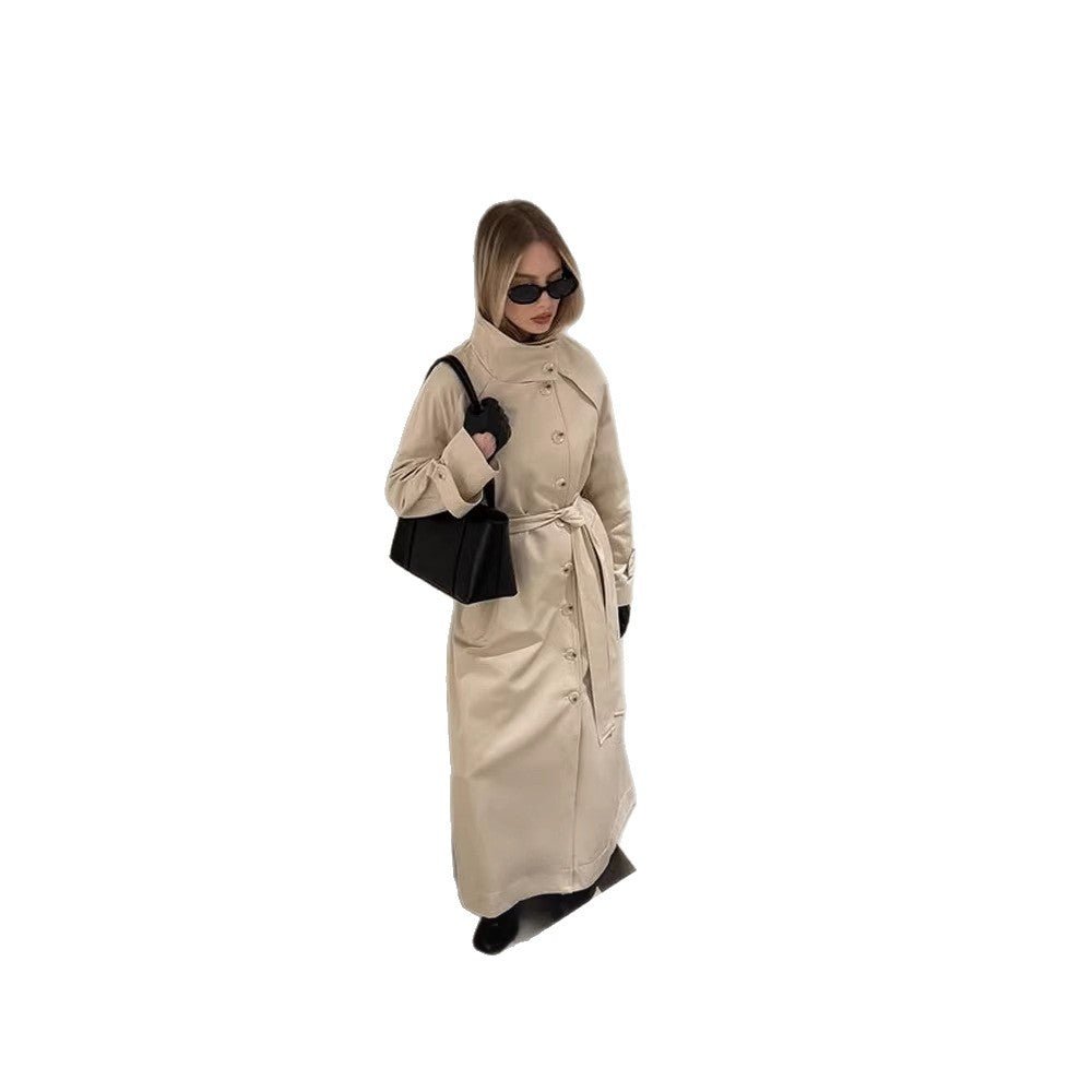 Ladies maxilength trench coat with high stand-up collar, double-breasted button placket and tie belt Chichicherry - Chichicherry