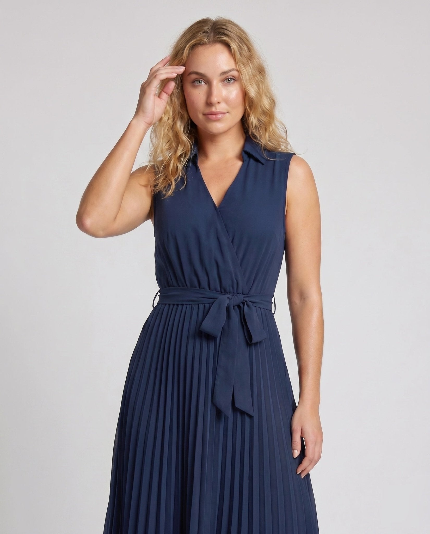 Ladies' midi dress with elegant wrap design and pleated skirt - Chichicherry