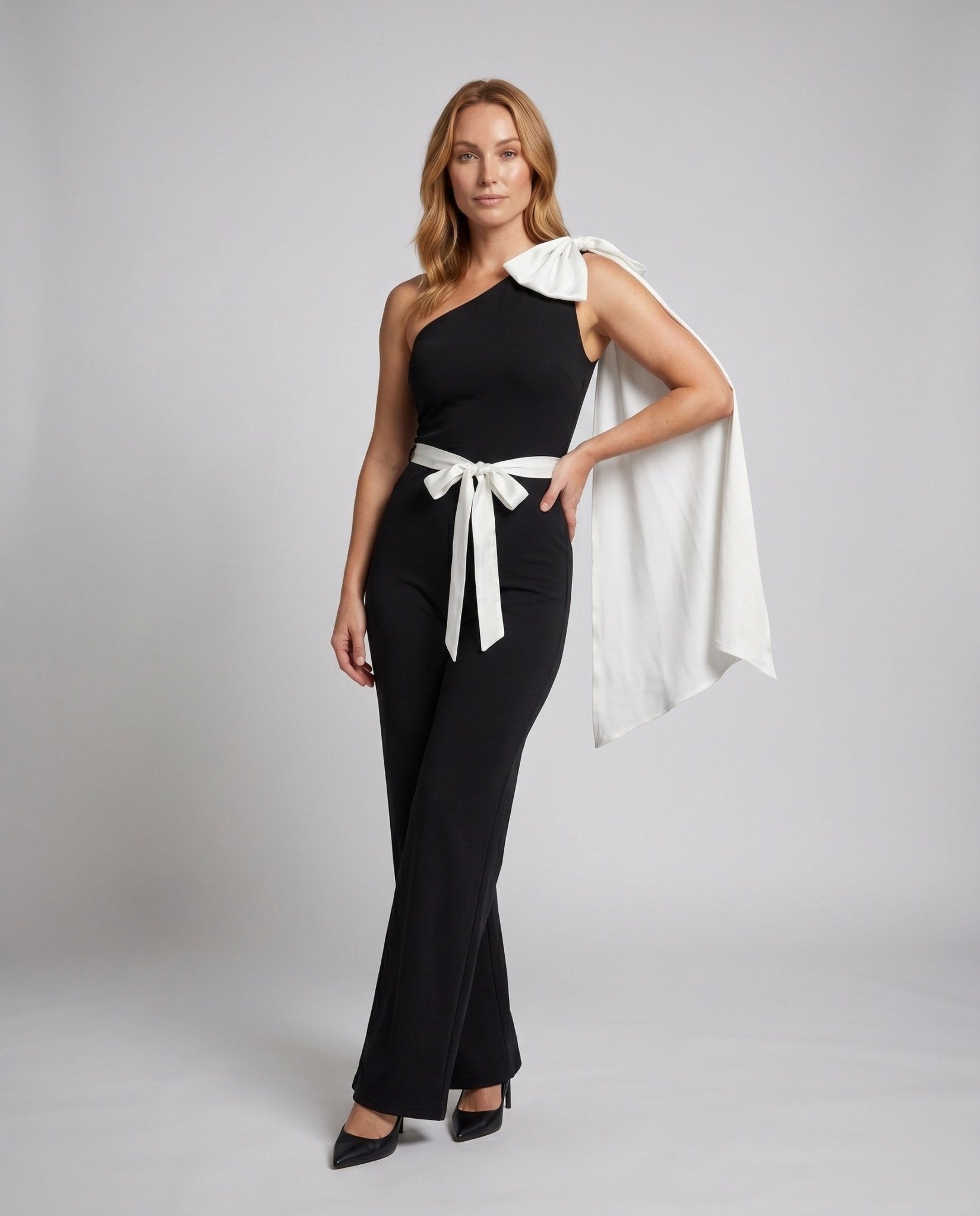 Ladies One-Shoulder Jumpsuit with elegant bow application and fitted belt - Chichicherry