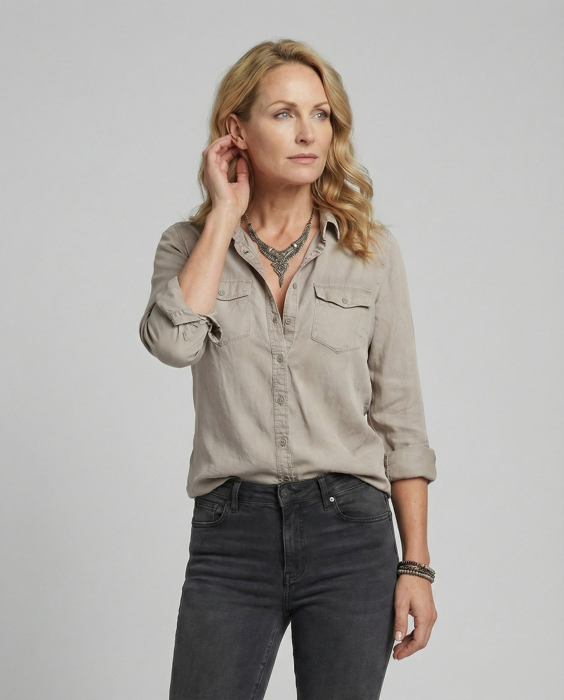 Women elegant blouse with deep V-neck