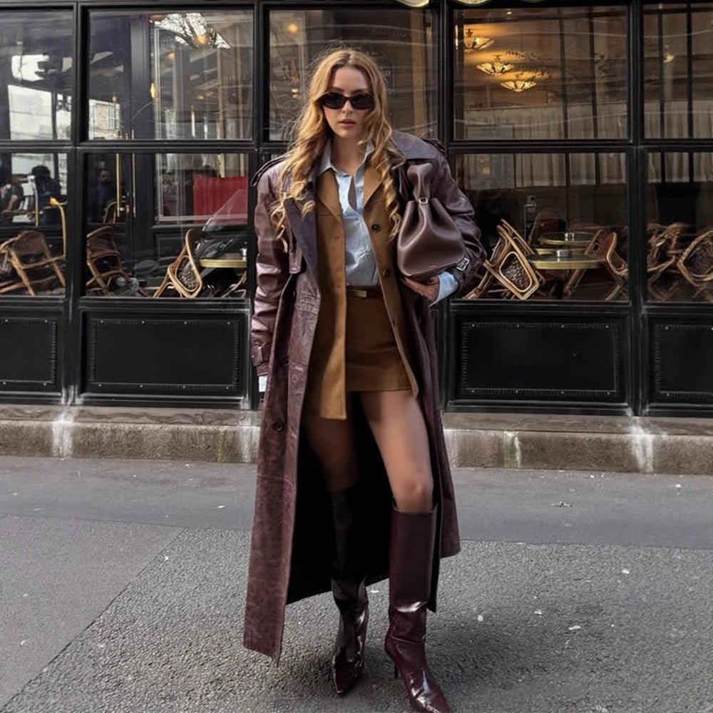 Women Long Trench Coat Made of Faux Leather with Oversized Shoulders and Tailored Silhouette Chichicherry - Chichicherry