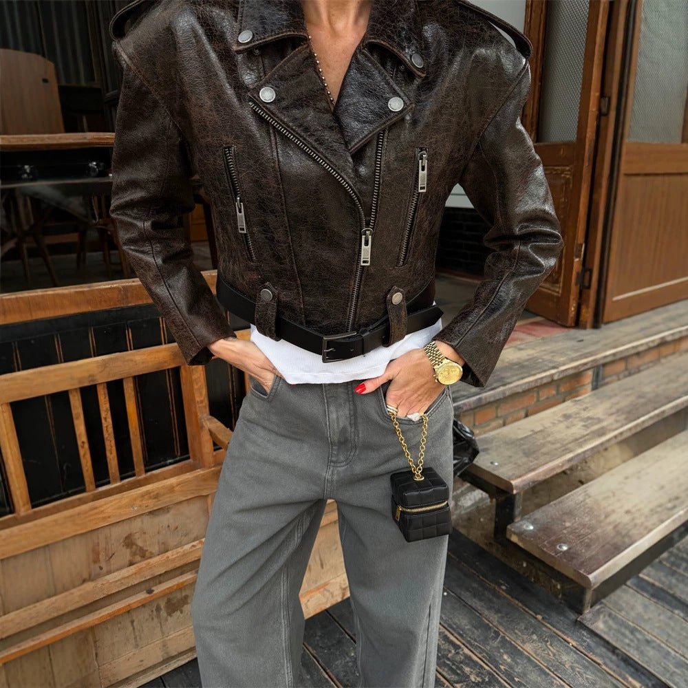 Women short cut biker jacket made of textured faux leather with waist belt Chichicherry - Chichicherry