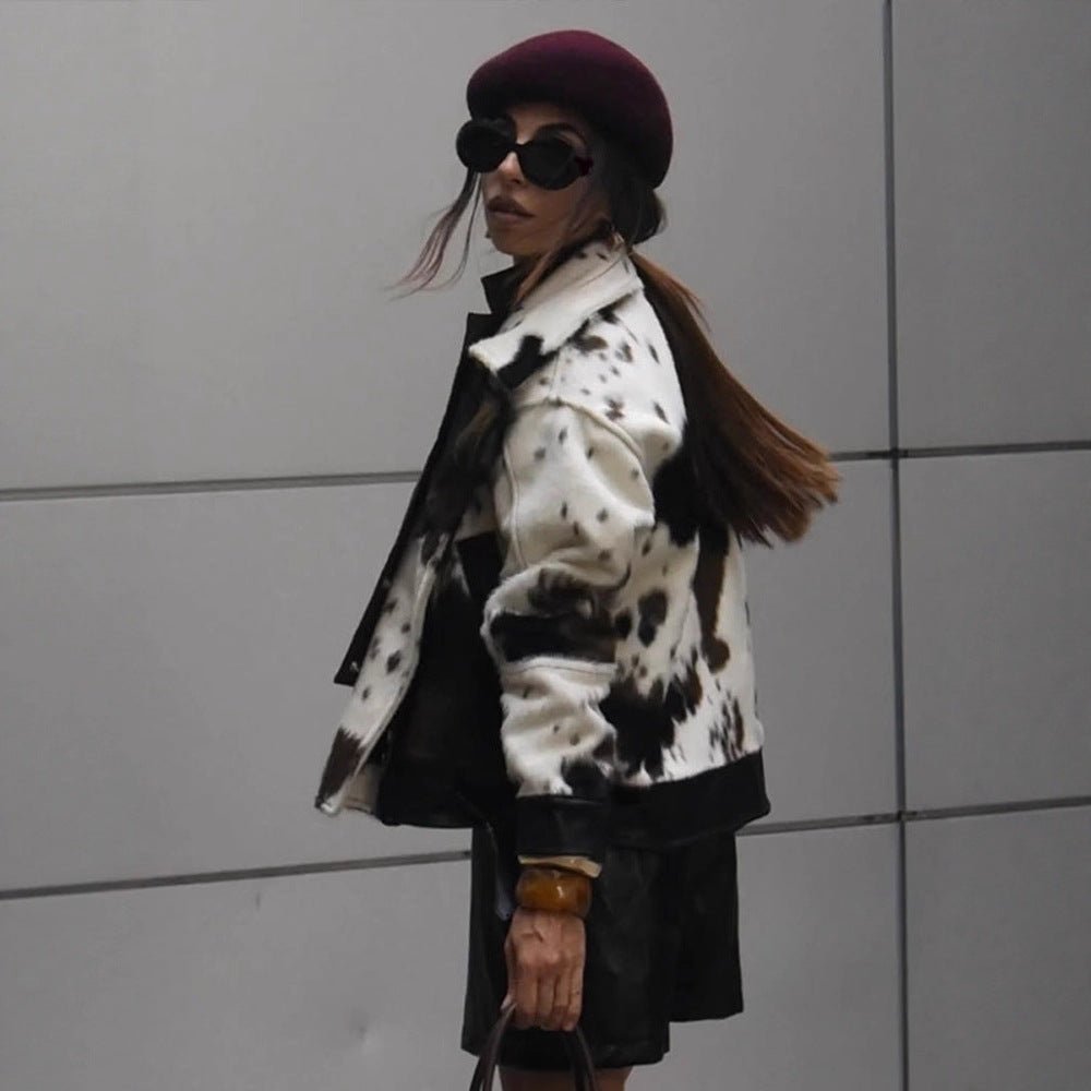 Women short padded biker jacket made of faux fur in cow print with contrast leather trim Chichicherry - Chichicherry