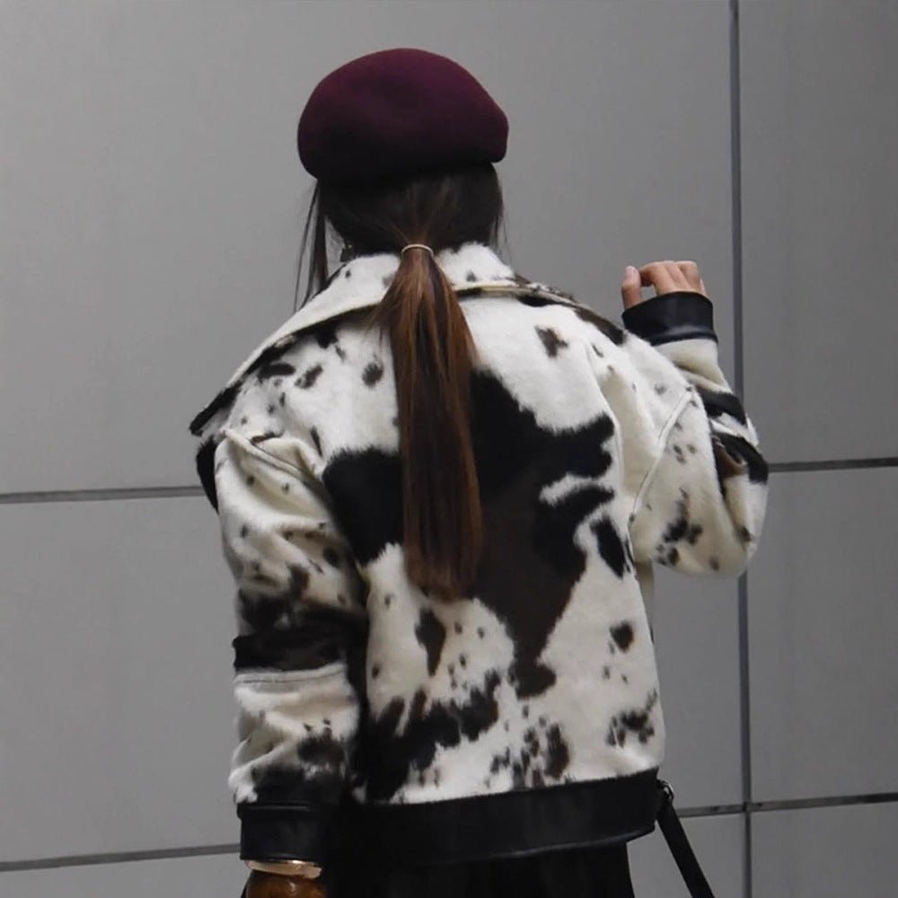 Women short padded biker jacket made of faux fur in cow print with contrast leather trim Chichicherry - Chichicherry