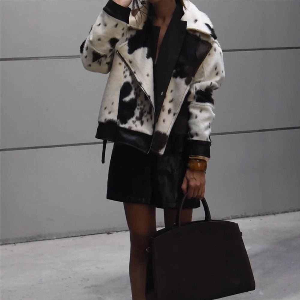 Women short padded biker jacket made of faux fur in cow print with contrast leather trim Chichicherry - Chichicherry