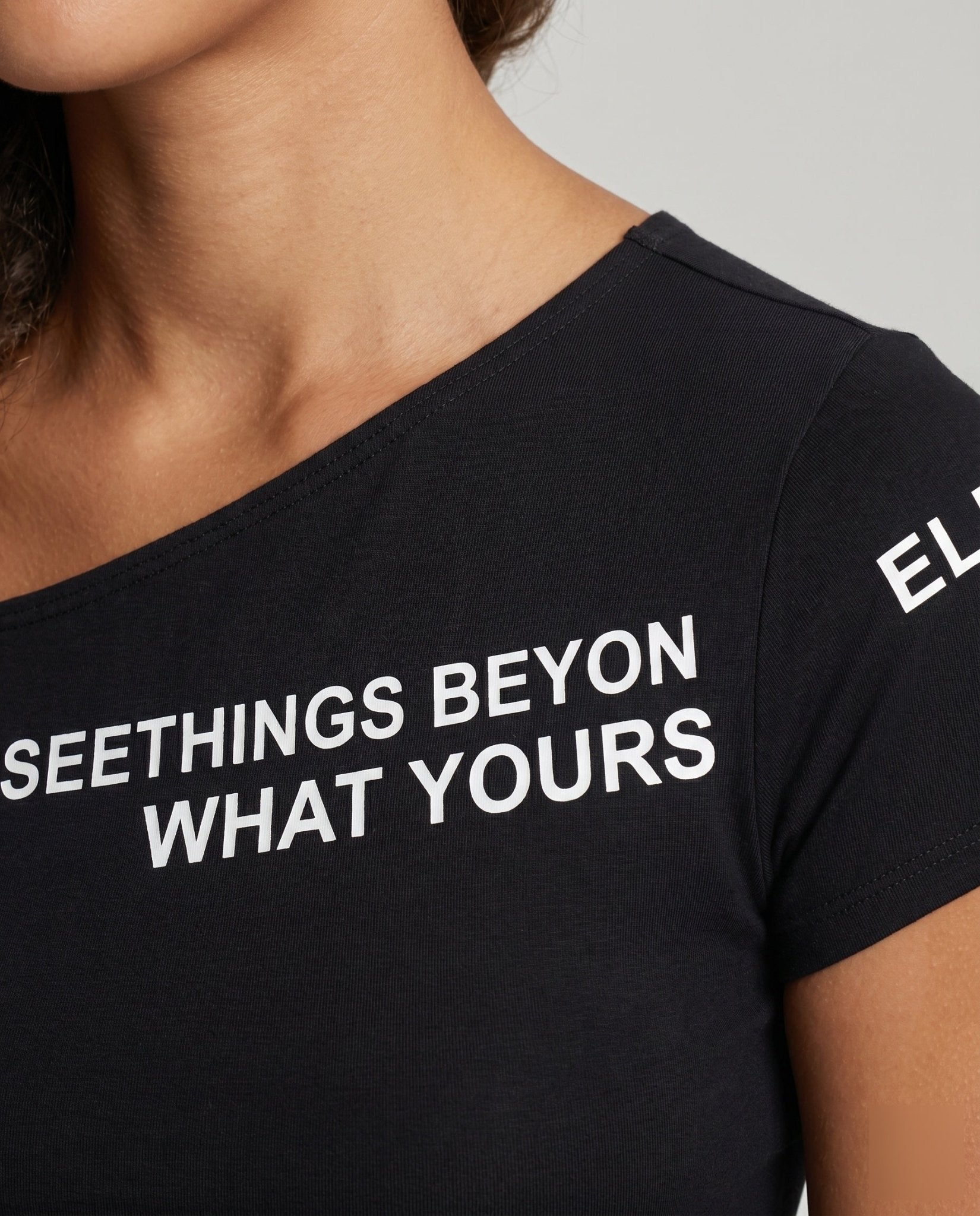 Women's asymmetrical short sleeve shirt with creative text graphic - Chichicherry