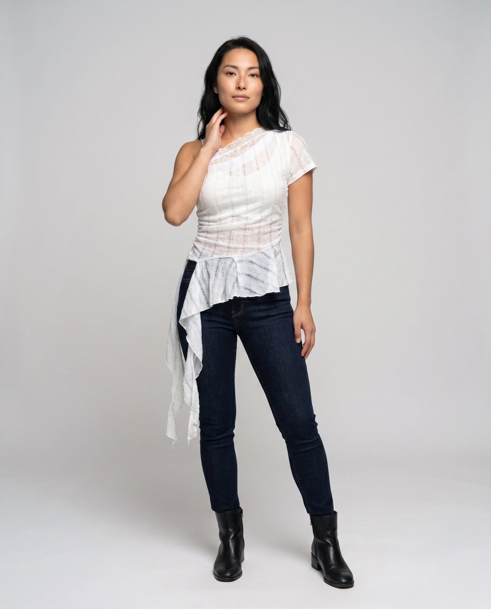 Women's asymmetrical top with stylish ruffle and decorative shoulder strap - Chichicherry
