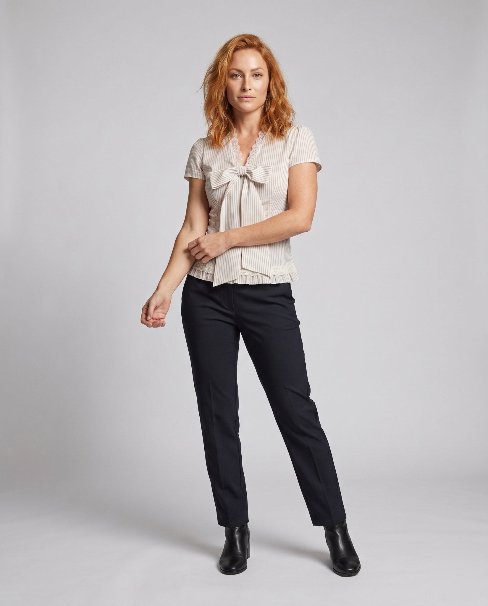 Women's blouse shirt with decorative bow design and fine ruffle details - Chichicherry