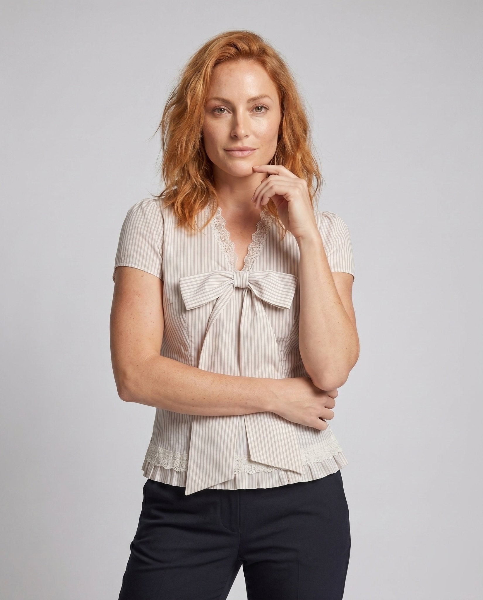 Women's blouse shirt with decorative bow design and fine ruffle details - Chichicherry
