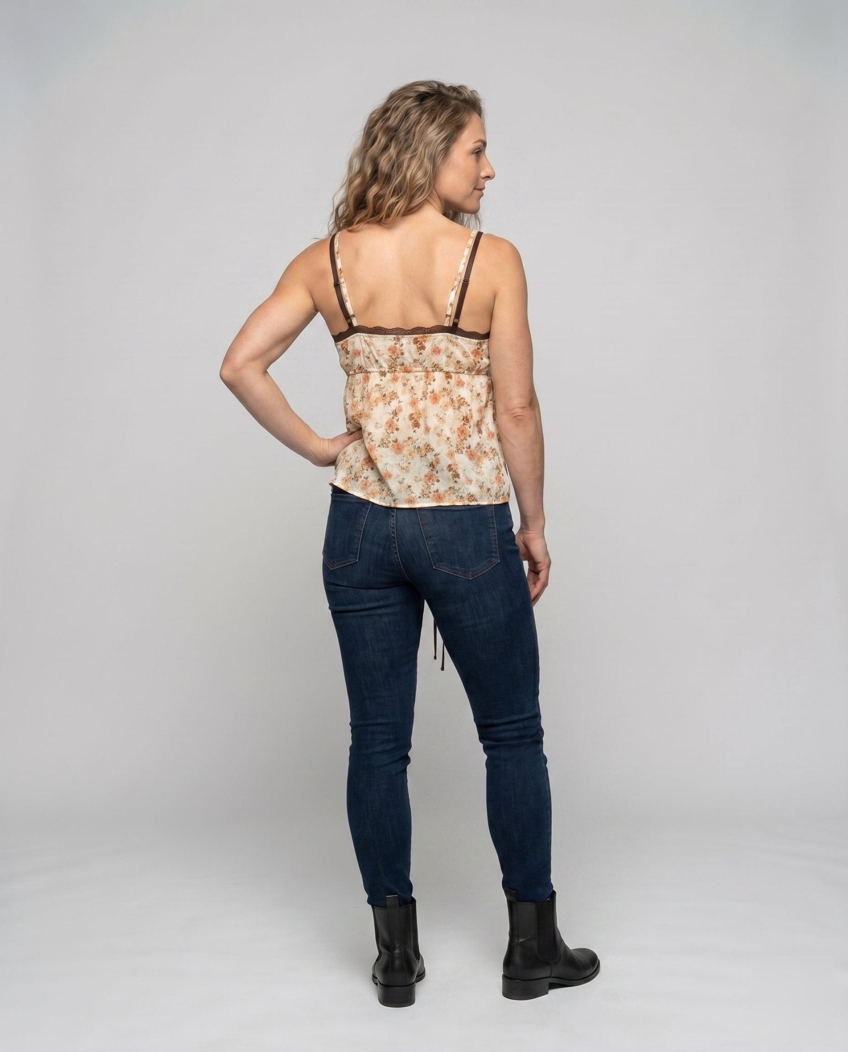 Women's blouse top with playful floral pattern and decorative spaghetti straps - Chichicherry