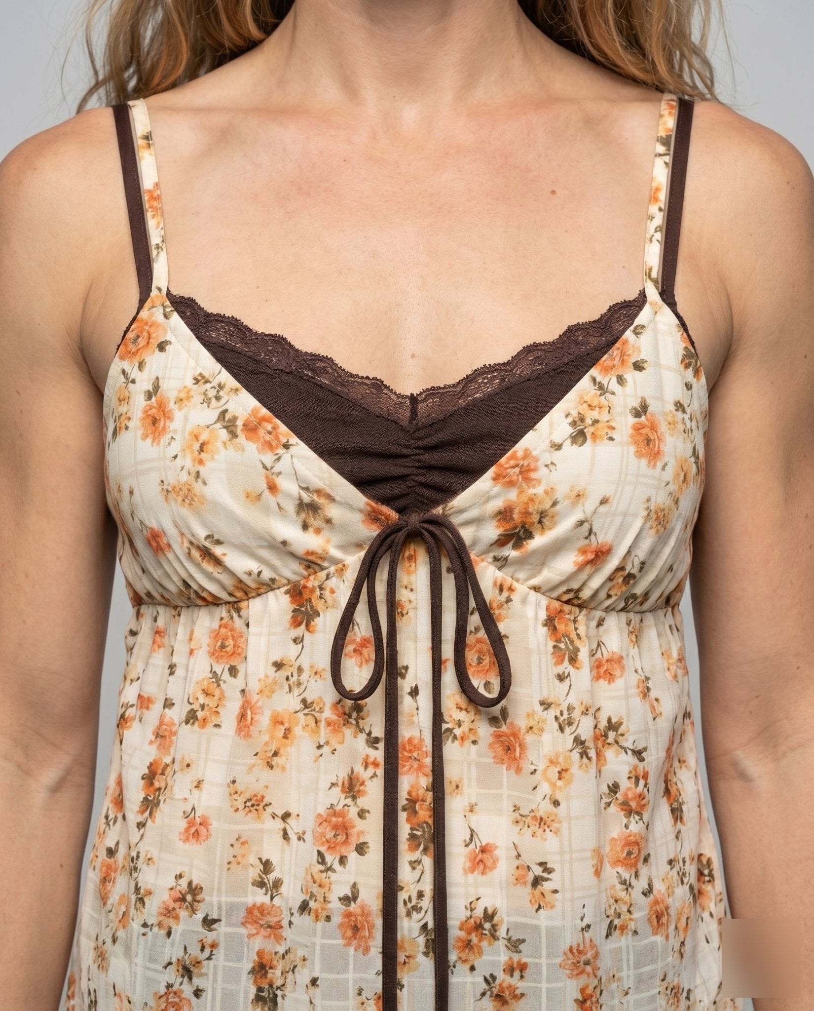Women's blouse top with playful floral pattern and decorative spaghetti straps - Chichicherry