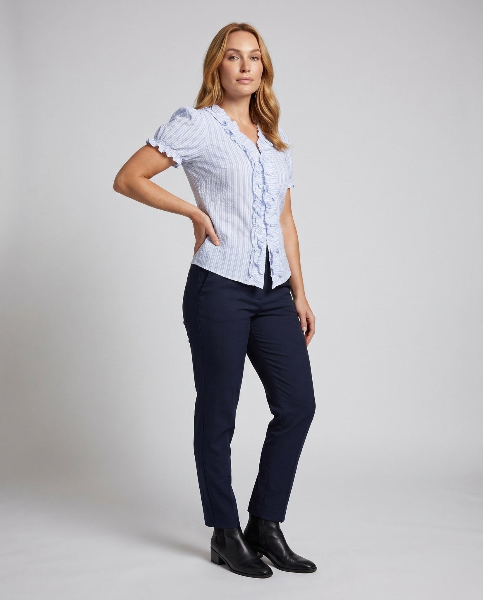 Women's blouse with ruffle details and fine stripe texture - Chichicherry