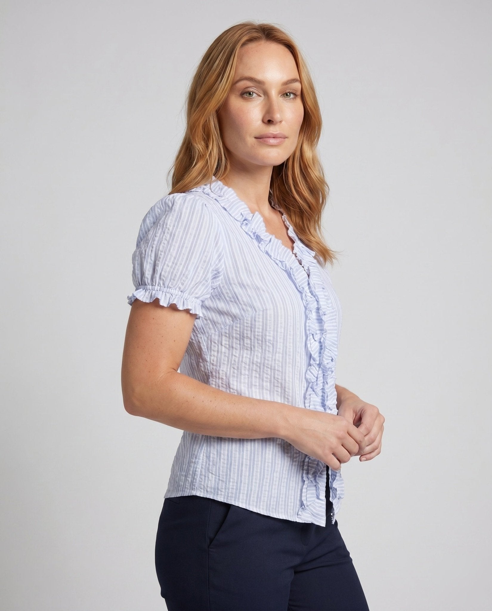 Women's blouse with ruffle details and fine stripe texture - Chichicherry