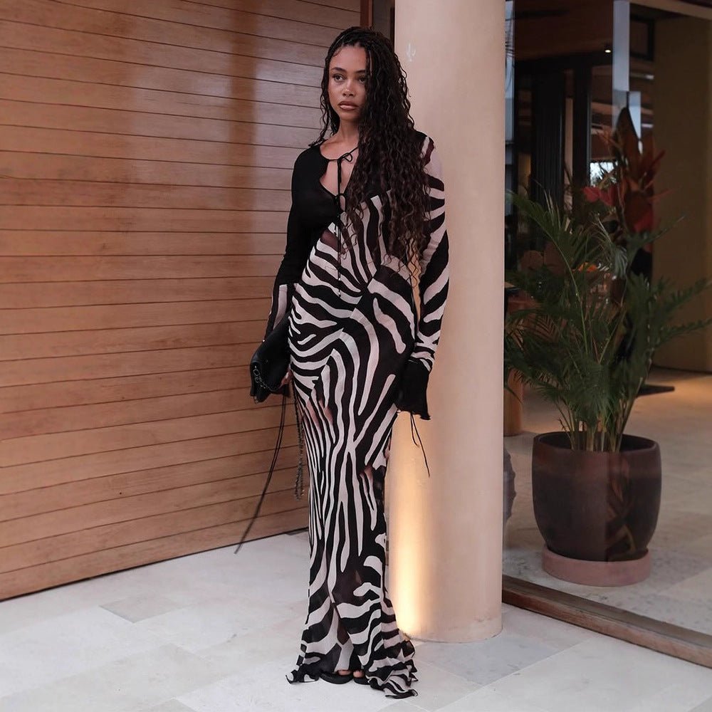 Women's body-hugging mesh maxi dress with deep V-neckline & graphic zebra print Chichicherry - Chichicherry