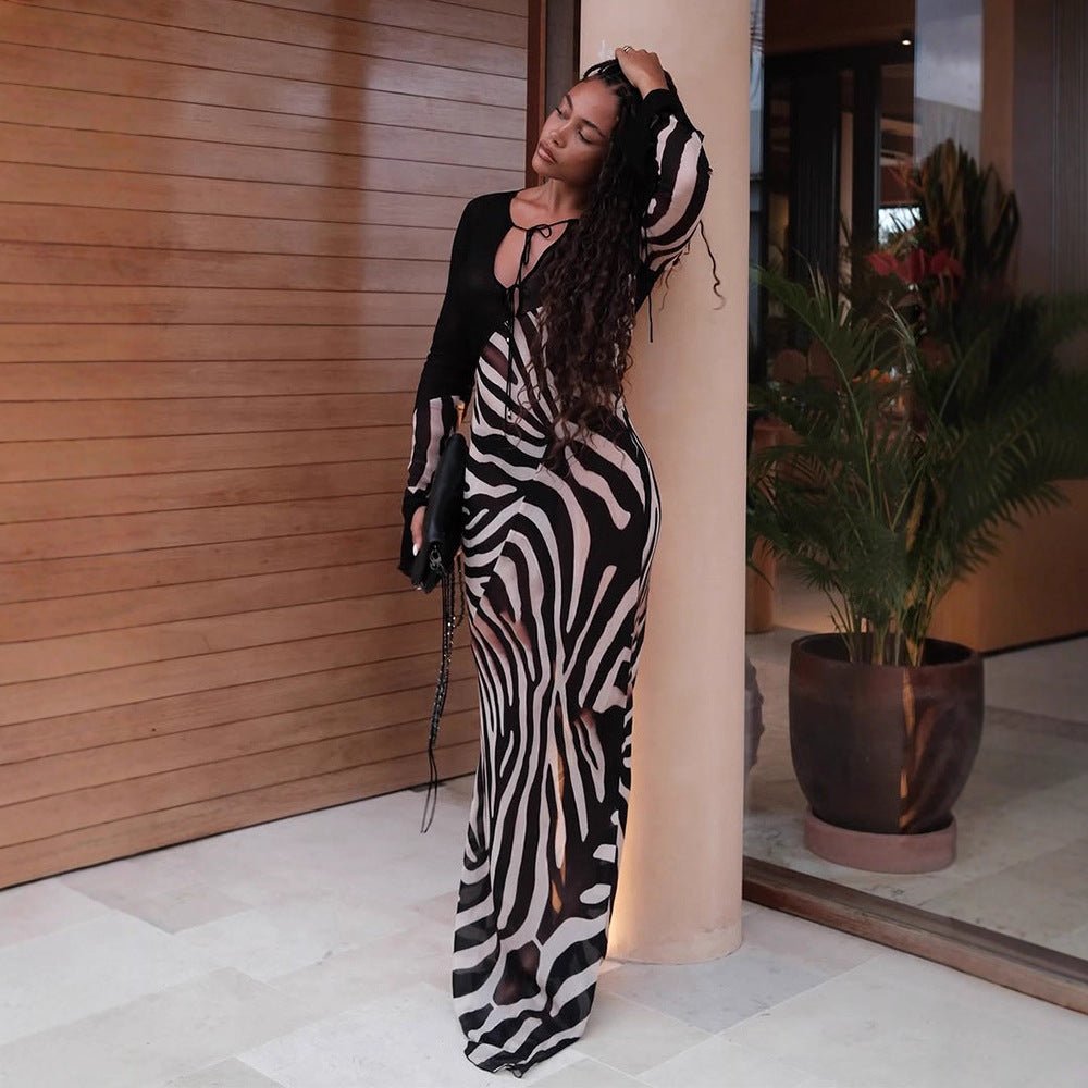 Women's body-hugging mesh maxi dress with deep V-neckline & graphic zebra print Chichicherry - Chichicherry
