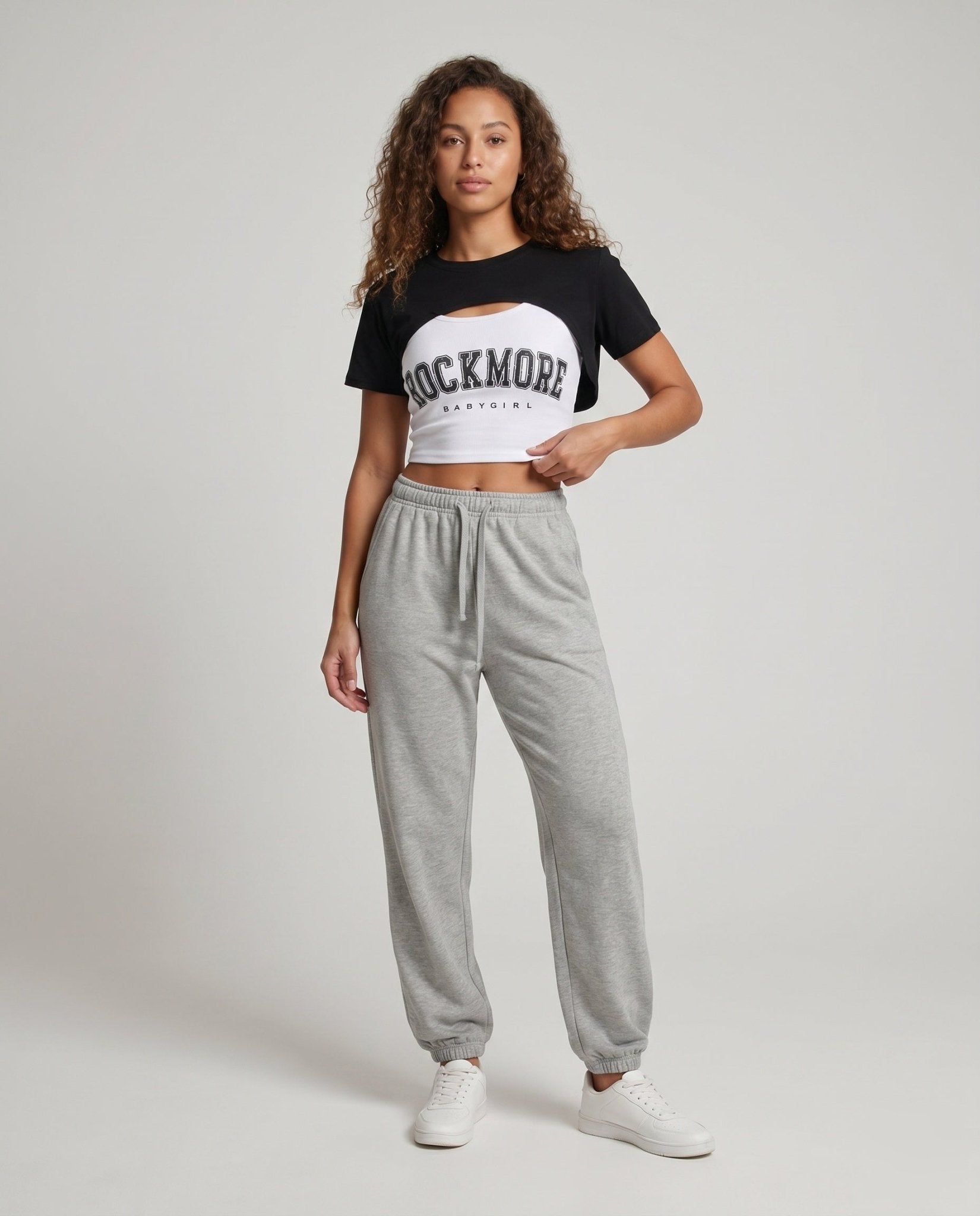 Women's casual crop top with asymmetrical cut and stylish badge - Chichicherry