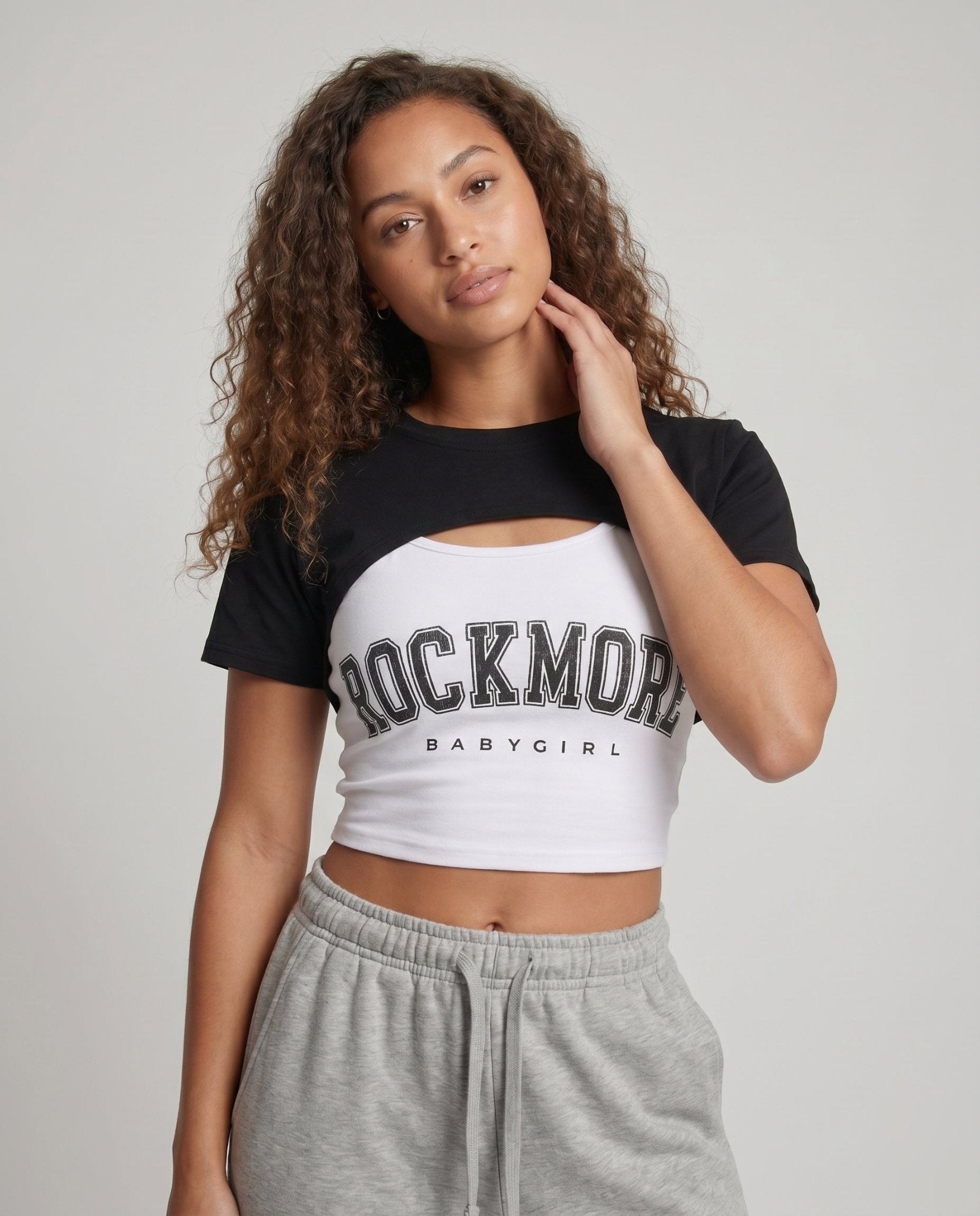 Women's casual crop top with asymmetrical cut and stylish badge - Chichicherry