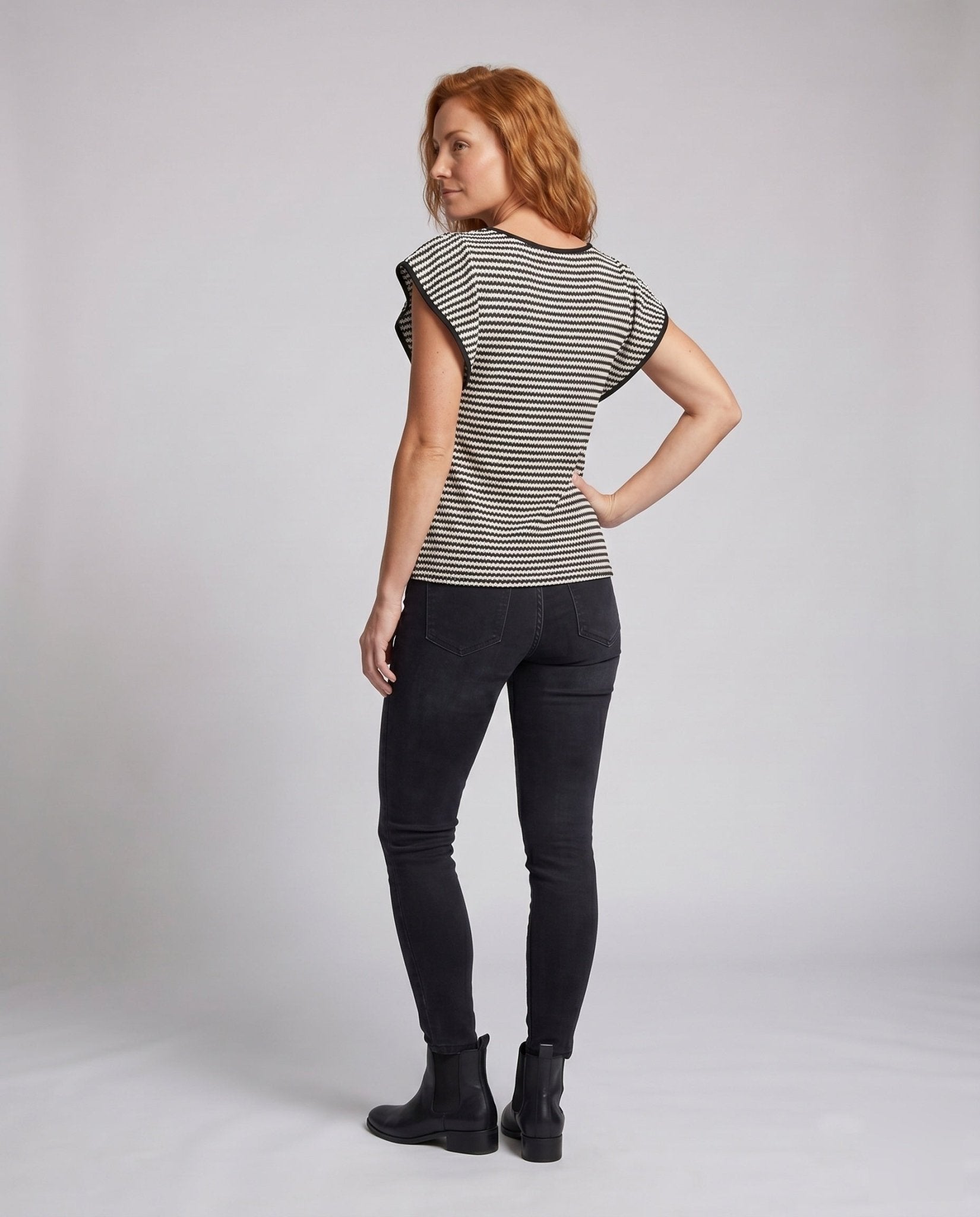 Women's casual short sleeve top with a modern striped pattern and soft material - Chichicherry