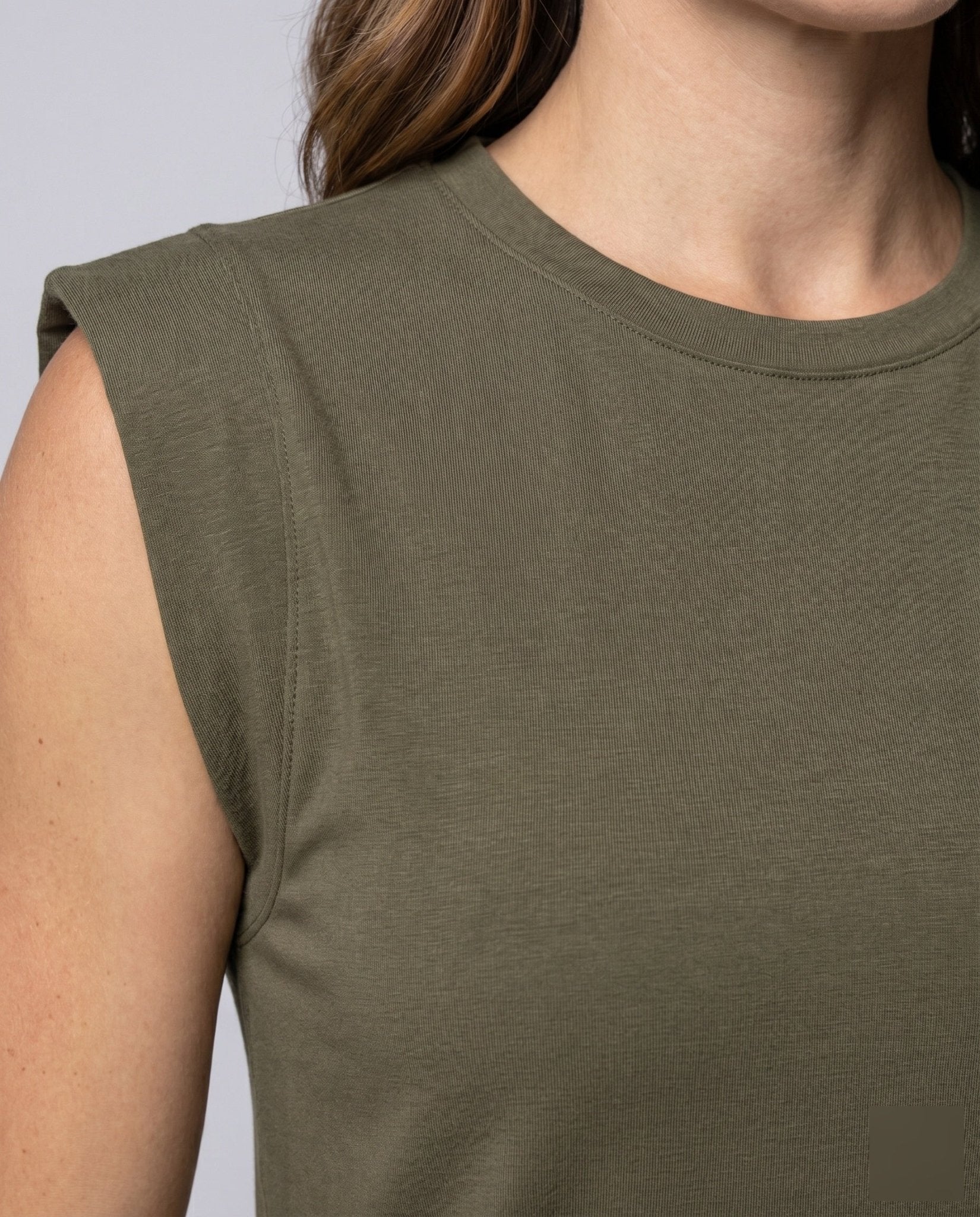 Women's casual T-shirt dress with sleeveless cut and elegant minimal design - Chichicherry