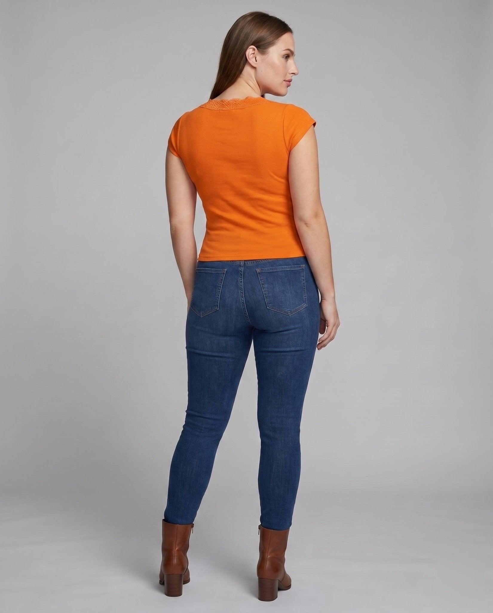 Women's fitted top with decorative ruffle detail and deeper V-neck - Chichicherry